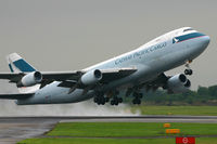 B-HMF @ EGCC - A damp departure for this freight dog. - by Kevin Murphy