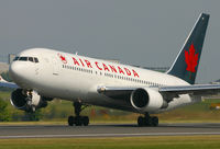 C-GAVC @ EGCC - Air Canada 767 leaving 24L. - by Kevin Murphy