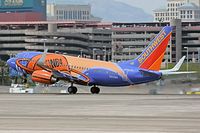 N224WN @ LAS - Southwest Airlines N224WN - Slam Dunk - departing RWY 25R. - by Dean Heald