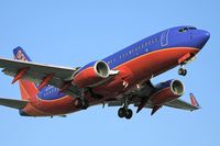 N234WN @ LAX - Southwest Airlines N234WN (FLT SWA969) from McCarran Int'l (KLAS) - Las Vegas, Nevada, on short-final for RWY 24R. - by Dean Heald