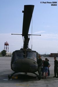 69-15263 @ NCA - Nose on, with the venerable Huey - by Paul Perry