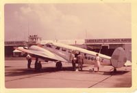 N9887Z @ KCMI - Taken by my Great Grandfather (co-pilot) between 1959-1960 while it was being used by the Illinois State Water Survey for studying the effects of Electricity on Thunder storm cell propagation.