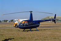 G-CBZE @ BOH - Robinson R-44 - by Les Rickman