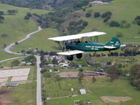 N8877 - 1929 Travel Air 4000 over Morgan Hill - by Matt Gregory