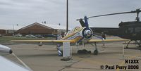 N12XX @ LFI - Yak taildragger parked amidst the NASA birds