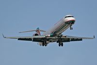 N923FJ @ LAS - America West Express (Mesa Airlines) N923FJ (FLT ASH6612) from Los Cabos Int'l (MMSD) on final approach to RWY 25L. - by Dean Heald