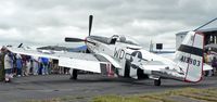 N751RB @ RDG - A large crowd gathers at the Mid Atlantic Air Museum World War II Weekend to admire this beautiful gleaming Mustang, appropriately named Glamourous Gal. - by Daniel L. Berek