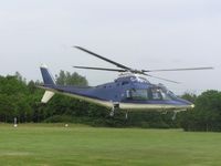 G-VIPH - Agusta A109 taking off from a hotel near Northampton - by Simon Palmer