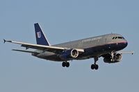 N428UA @ LAX - United Airlines N428UA (FLT UAL221) from Washington Dulles Int'l (KIAD) on final approach to RWY 24R. - by Dean Heald