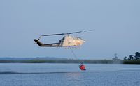 N131FC - AH-1F Cobra water pickup for firefighting run near Eastpoint, FL - by John B. Spohrer