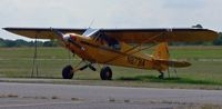 N87314 @ N51 - This Cub is well equipped for the rugged outdoors - just look at those tires! - by Daniel L. Berek