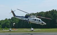 N7NJ @ SMQ - New Jersey State Police chopper takes off on another mission. - by Daniel L. Berek