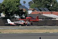 N464JS @ CPM - 2004 HARMON ROCKET II landing on RWY 25R at Compton Municipal Airport (KCPM). - by Dean Heald