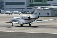 N978QS @ SMO - 2002 Cessna 750 Citation X N978QS, from Las Vegas McCarran Int'l (KLAS), on the brakes after landing on RWY 21. - by Dean Heald