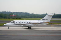 N425BJ @ PDK - Taxing past Mercury Air Service - by Michael Martin
