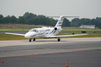 N525DG @ PDK - Taxing past Mercury Air Service - by Michael Martin