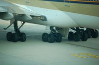 9V-SPD @ SIN - The landing gear of a B 747-400 has to endure enormous weights - by Micha Lueck