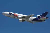 N563FE @ LAX - Fed Ex N563FE Kristine (FLT FDX3019) climbing out from RWY 25R enroute to Chicago O'Hare Int'l (KORD). - by Dean Heald