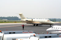 N500PE @ PDK - Being directed to parking at Mercury Air Service - by Michael Martin