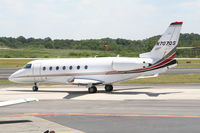 N707QS @ PDK - Execjet 707 Taxing to Signature Air - by Michael Martin