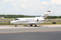 N870QS @ PDK - Execjet 870 taxing to Signature Air - by Michael Martin