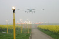 OO-TUC @ BRU - landing on rwy 25R in the fog ! - by Daniel Vanderauwera