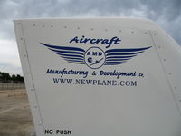 N367AM @ MER - close-up Aircraft Manufacturing & Development Company logo @ Castle AFB, CA - by Steve Nation