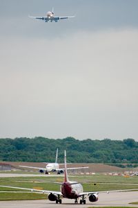 PH-MCU @ STN - On final with 1 departure ahead.