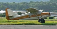 N6513M @ N07 - This 1949 Stinson 108 has been refitted with baloon tires. - by Daniel L. Berek