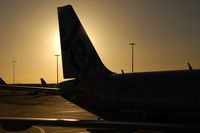 VH-VQS @ MEL - Basking in the warm evening sun - by Micha Lueck