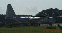 1719 @ ECG - Backlit, a shiny unpainted Herc - by Paul Perry
