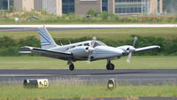 N13LM @ PDK - Landing 20R just feet from the runway - by Michael Martin
