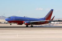 N426WN @ LAS - Southwest Airlines N426WN (FLT SWA2014) from Phoenix Sky Harbor Int'l (KPHX) touching down on RWY 25L. - by Dean Heald