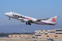 LX-VCV @ LAX - Cargolux LX-VCV (FLT CLX775) climbing out from RWY 25R enroute to Luxembourg (ELLX). - by Dean Heald