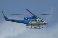 9Y-TJM @ POS - Bristow Bell 412 - by Yakfreak - VAP