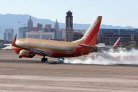 N734SA @ LAS - Southwest Airlines N734SA touching down on RWY 25L. - by Dean Heald