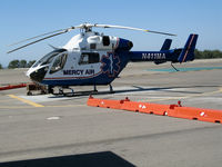 N411MA @ CRQ - Mercy Air 2001 MDD MD900 on standby @ McClellan-Palomar Airport, CA - by Steve Nation