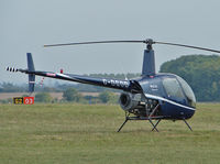 G-DGOD @ EGBP - Robinson R22 Beta