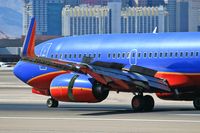 N455WN @ LAS - Close-up of Southwest Airlines N455WN (FLT SWA2966) from Tucson Int'l (KTUS) rolling out after landing on RWY 25L. - by Dean Heald