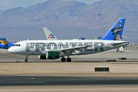 N948FR @ LAS - Frontier Airlines Pete - Pelican N948FR starting takeoff roll on RWY 25R. - by Dean Heald