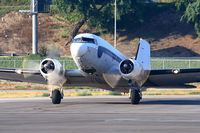 N2298C @ LGB - Catalina Flying Boats DC-3 taxiing towards RWY 30 prior to departure to Catalina Island (KAVX) for cargo delivery. - by Dean Heald