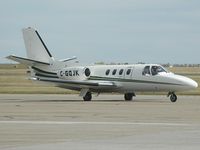 C-GQJK @ YYC - Stop for customs - by Bill Knight