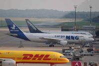 TC-MND @ CGN - MNG Cargo at Cologne/Bonn. In front is DHL B757 OO-DPN - by Micha Lueck