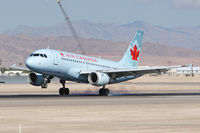 C-FYKC @ LAS - Air Canada C-FYKC (FLT ACA597) from Lester B Pearson Toronto Int'l (CYYZ) touching down on RWY 25L. - by Dean Heald