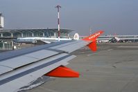 G-EZID @ BSL - passing on right side easyjet-terminal and left is swiss-part of airport-building in front is the N73544 Super-Constellation - by eap_spotter