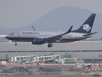 N997AM @ MMMX - Boeing 737NG on final at Mexico City - by John J. Boling