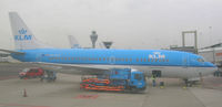 PH-BTD @ EHAM - Boeing 737-300 at gate - by John J. Boling