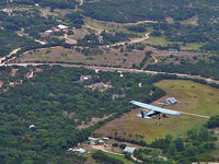 N1115R - flying over hillcountry - by Phil
