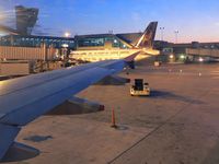 N918FR @ PHL - Another view of this aircraft, showing the whitetail deer motif. Taken from an Air Jamaica A320 in the early morning. - by Daniel L. Berek