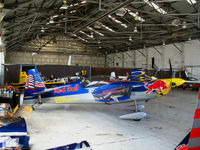 N540ZA @ OAK - Red Bull/Chambliss Aerobatics 2004 Zivko Aeronautics EDGE540 after Fleet Week Red Bull air race minus wings and Australia bound @ Oakland International Airport, CA - by Steve Nation